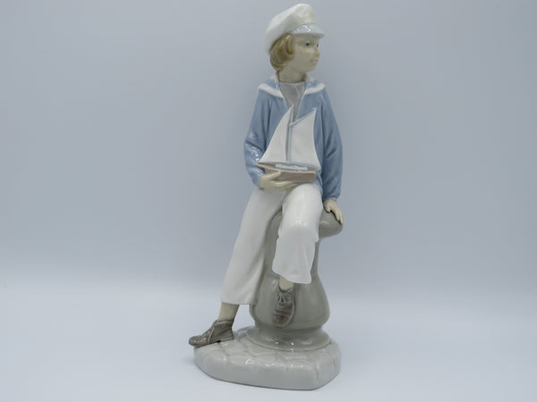 Retired Boy with Yacht Lladro 4810 figure