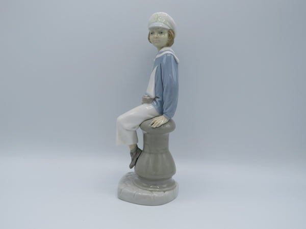 Retired Boy with Yacht Lladro 4810 figure