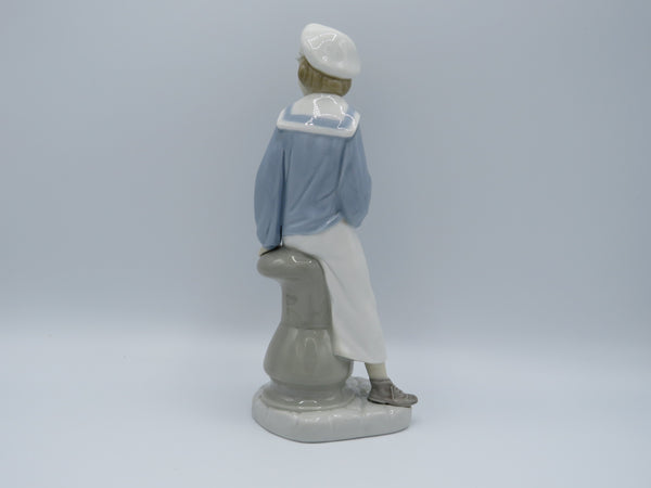 Retired Boy with Yacht Lladro 4810 figure