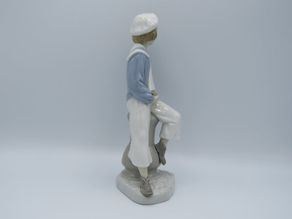 Retired Boy with Yacht Lladro 4810 figure