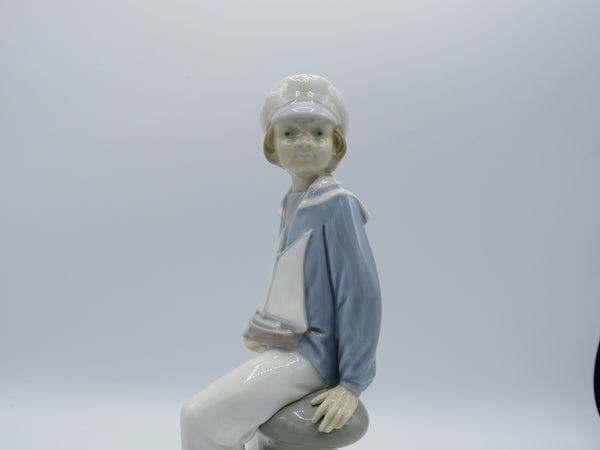 Retired Boy with Yacht Lladro 4810 figure