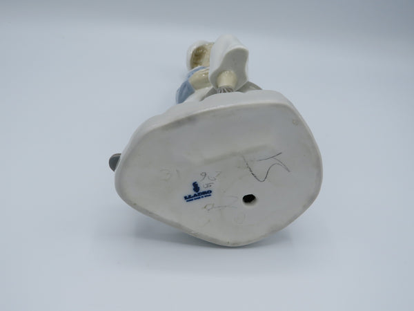 Retired Boy with Yacht Lladro 4810 figure